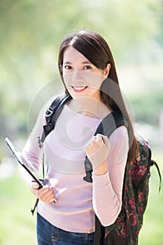 Woman student with digital tablet