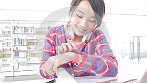 Woman student in the libray