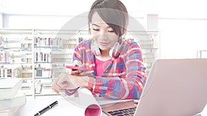 Woman student in the libray