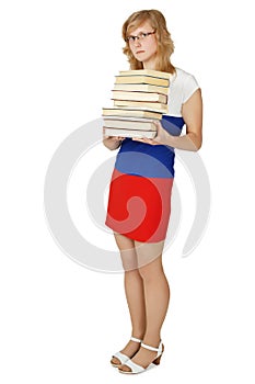 Woman - student with a pile of books