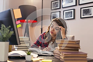 Woman studying photo