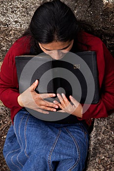 Woman Studying the Bible and Praying