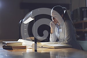 Woman studying late at night