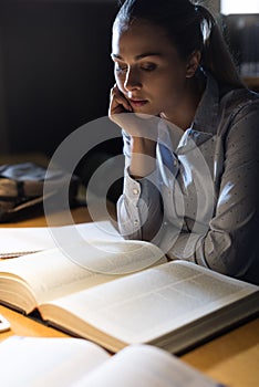 Woman studying late at night