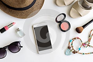 Woman stuff, makeup, cellphone and accessories with copy space