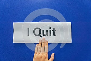 Woman submit resignation letter to quit the job with blue background