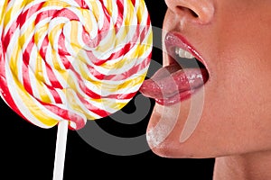 Woman sucking cute sweet candy