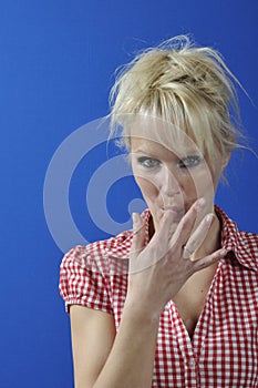 Woman sucking her finger