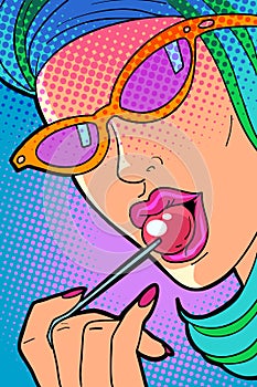 Woman sucking a Lollipop