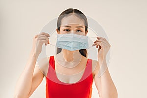 Woman suffer from cough with face mask protection