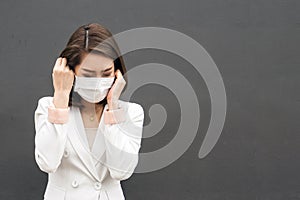 Woman suffer from sick and wearing face mask.