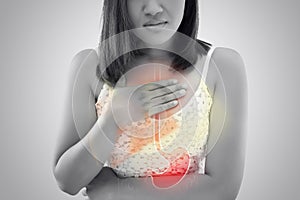 Woman suffering from Acid reflux or Heartburn