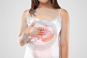 A woman suffering from gastroesophageal reflux disease