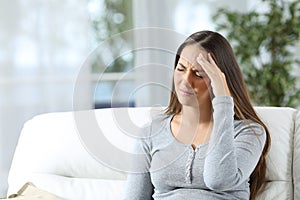 Woman suffering headache