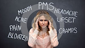 Woman suffering headache due to imaginary problems in pms, hormone imbalance