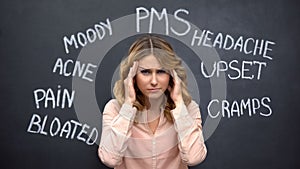 Woman suffering headache due to imaginary problems in pms, hormone imbalance photo