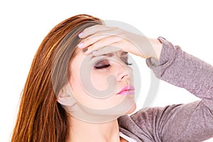 Woman suffering from headache migraine pain