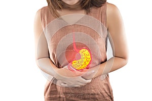 Woman suffering from indigestion or gastric. photo