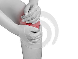 Woman suffering from knee pain, joint pains. mono tone highlight