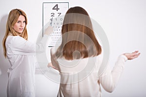 Woman suffering for myopia