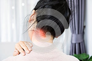 Woman suffering from neck back,  occipital pain photo