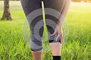 Woman suffering from pain in leg injury,Calf muscle in pains after sport exercise running jogging and workout outdoor