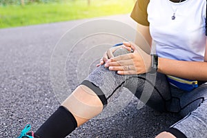 Woman suffering from pain in legs,knee injury after sport exercise running jogging and workout