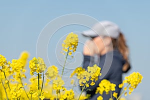 woman suffering from pollen allergy while training outdoors
