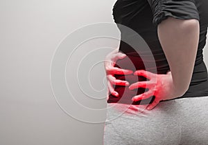 Woman suffering from ribbing pain photo
