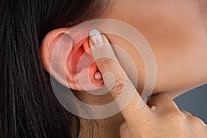 Woman Suffering From Sore Ear