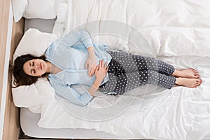 Woman Suffering From Stomach Ache