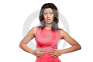 Woman suffering from stomach ache abdominal pain.