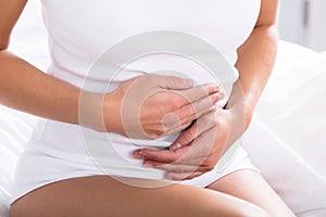 Woman Suffering From Stomach Pain