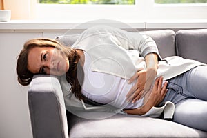 Woman Suffering From Stomach Pain