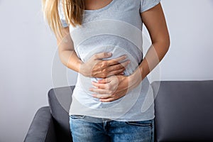 Woman Suffering From Stomach Pain