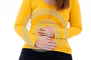 Woman suffering from stomach pain and injury isolated white background. Health care and medical concept