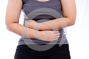 Woman suffering from stomach pain and injury isolated white background. Health care and medical concept