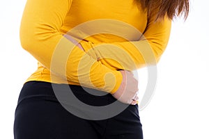 Woman suffering from stomach pain and injury  white background. Health care and medical concept