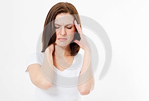 Woman suffering from stress or headache grimacing in pain as she holds the back her neck with her other hand to her temple