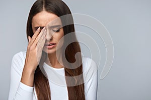 Woman Suffering From Strong Pain, Having Headache, Touching Face