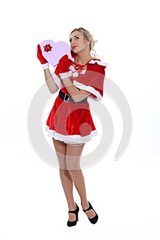 Woman in suggestive Christmas costume photo