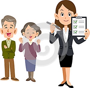 A woman in a suit showing a checklist to a senior couple