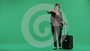 Woman with suitcase beckoning inviting to come here