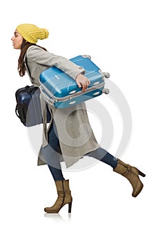 The woman with suitcase ready for winter vacation