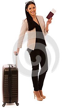 Woman with suitcase and travel documents going on a business trip.