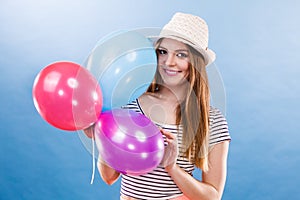 Woman summer joyful girl with colorful balloons