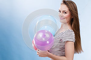 Woman summer joyful girl with colorful balloons