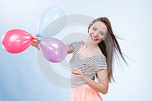 Woman summer joyful girl with colorful balloons