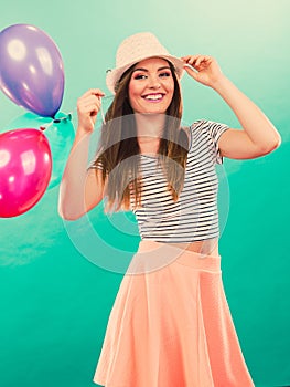 Woman summer joyful girl with colorful balloons