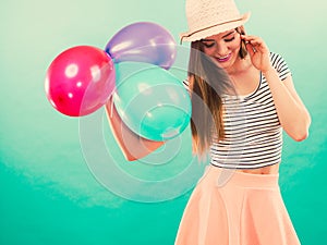 Woman summer joyful girl with colorful balloons